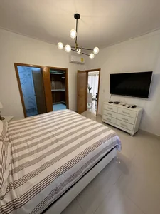 Apartamento en alquiler en el sector de Naco, amueblado con piscina y gimnasio - Imagen 12