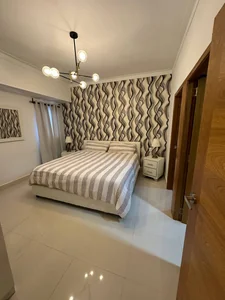 Apartamento en alquiler en el sector de Naco, amueblado con piscina y gimnasio - Imagen 13