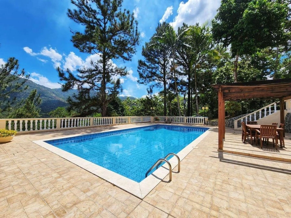Villa in Bonao with a pool surrounded by green areas - View 4